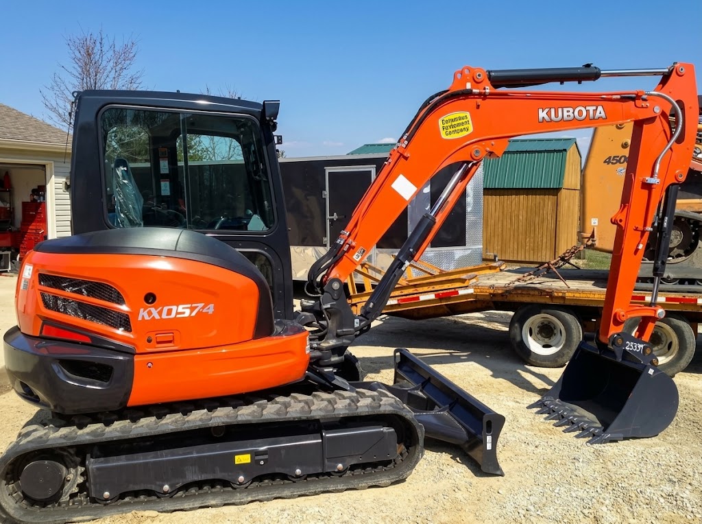 Kubota KX057-4 excavator on a job site, the machine used for residential septic system installation in Urbana Ohio
